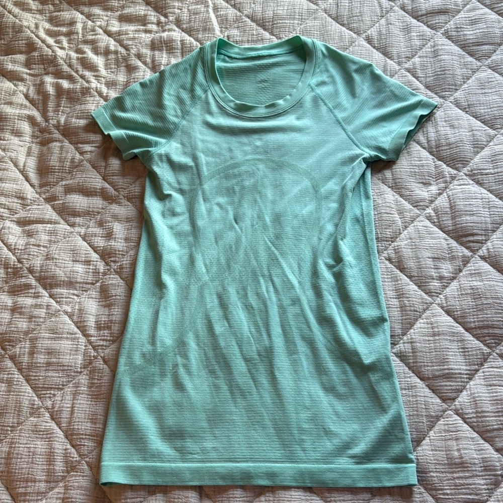 mint green swiftly shirt size 4